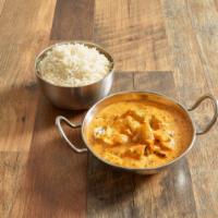 Chicken Tikka Masala · Cooked in mildly spiced tomato, onion gravy with green peppers, onions and fresh cilantro. S...