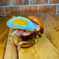 Weekender Burger · Single smash burger 4 oz, American cheese, fried egg, bacon, homemade brioche bun.
