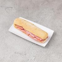 Italian Cold Cut Sub · Ham, salami, provolone cheese, sprinkled with parmesan cheese and oregano, topped with house...