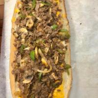 Philly Cheesesteak Sub · Sirloin steak meat, cheddar cheese sauce, with grilled green peppers, mushrooms and onions.