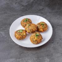 Kolokythokeftedes Mykonos · Zucchini and cheese croquettes. 