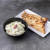 Tzatziki · Yogurt, cucumber, garlic and dill spread.