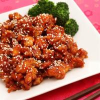 Sesame Chicken Dinner Combo · Served with choice of side, soup and egg roll.