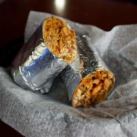 Crazy Chicken Fajita Burrito · Grilled marinated chicken breast with mixed vegetables, pinto beans, Mexican rice, Monterey ...