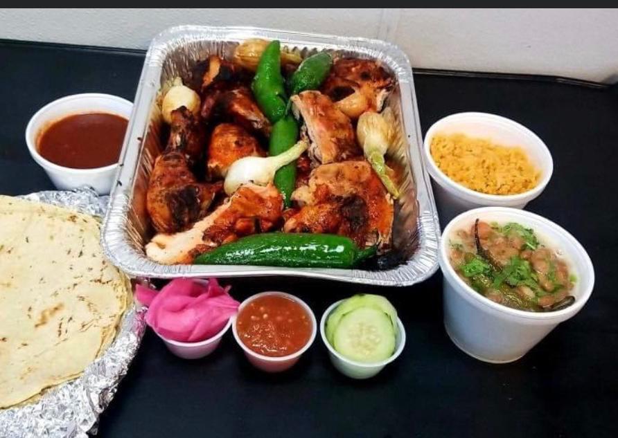 Pollo Asado · Grilled chicken. Pollo entero con arroz, frijoles, ensalada y tortillas. Chicken with rice, beans, salad and tortillas.
