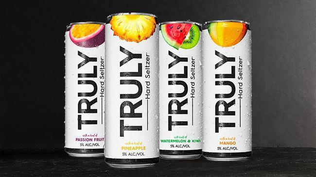 Truly Hard Seltzer Can · Passion Fruit, Mango, Pineapple, Watermelon Kiwi - 5% ABV - 12oz Can - Made with simple ingredients and hints of our favorite fruits. Never made with artificial sweeteners or flavors.