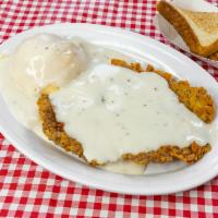Chicken Fried Steak Dinner · Premium beef steak cutlet, hand breaded in our supreme breading and topped with homemade cre...