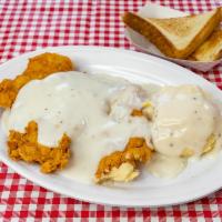 Chicken Fried Chicken Dinner · Premium chicken breast, hand breaded in our supreme breading and topped with homemade cream ...