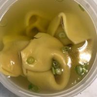Use1. Wonton Soup · Seasend broth with filled wonton dumplings.