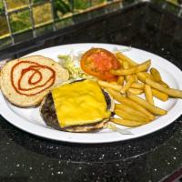 Greek Burger · Beef handmade patty with feta cheese, tomatoes and onions on a bun.