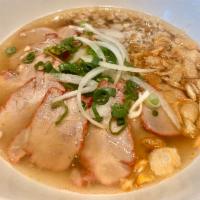14 BBQ Pork Pho · Richly seasoned Vietnamese style beef broth ladled over rice noodle, sliced BBQ pork and gro...
