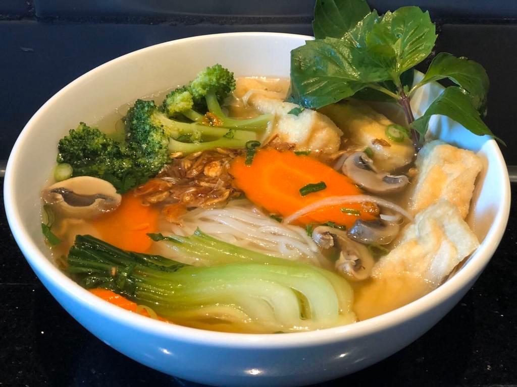 16. Vegetarian Pho · Richly seasoned 100% vegetable stock ladled over rice noodles and fresh or fried tofu, vegetables and mushrooms. Gluten free. Vegan friendly.