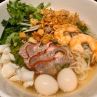 18. Phnom Penh Noodle Soup  · Shrimps, squids, quail eggs, BBQ pork and fried ground pork with rice noodles in rich aroma ...