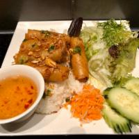 29a. Crispy Spring Rolls Rice/Noodle · Crispy rolls stuffed with ground pork, carrots and taro served with fish sauce.