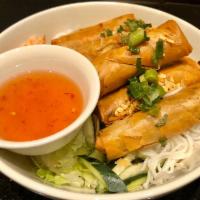  29b. Vegetarian Crispy Rolls Noodle/Rice · Crispy rolls stuffed with tofu, taro, cabbage, glass noodles served with homemade vegetarian...