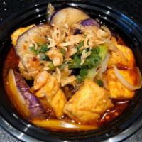 40. Eggplant Tofu Clay Pot · Asian eggplant braised in shallot soy sauce with onion, garlic and black pepper, crispy tofu...