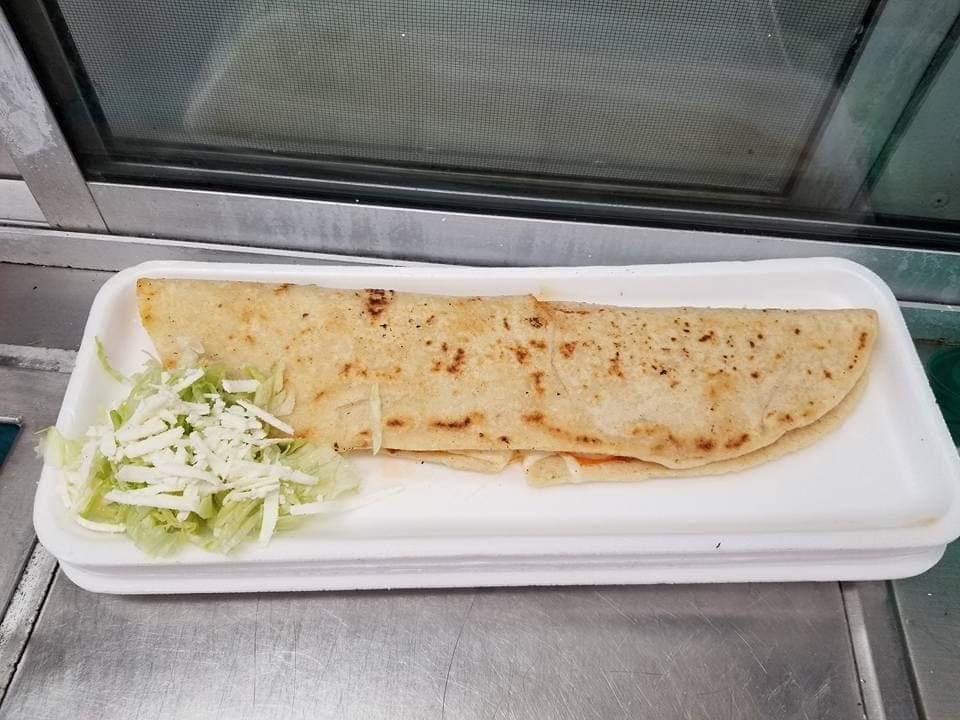 Machete Regular · Traditional home made tortilla fill with cheese serve with lettuce and tomato.