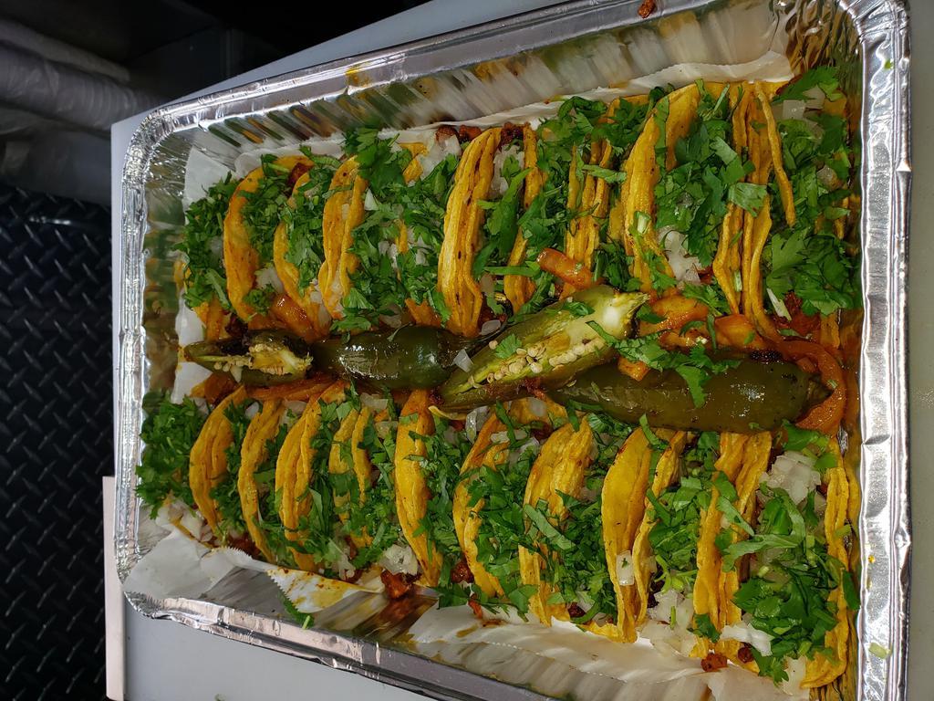 Charola de 20 Mini Tacos · 20 minitacos choice of meat chicken,pastor chicharron or ground beef served with cilantro onions or lettuce and tomato. 4 charro beans please write and chose 2 options only no substitution no flour only corn.