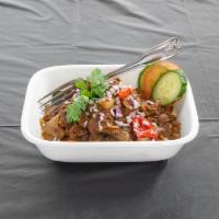 Aahaar Mutton Varuthakari · Lamb cooked with a spicy dry rub south indian style. Gluten free.