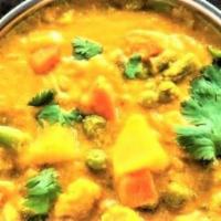 5. Agraharam Vegetable Kootu · Chayote, carrots, beans and peas cooked in a mildly spiced coconut and dal gravy.