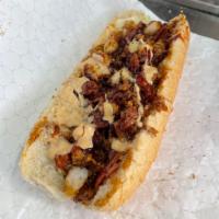 NB Chicken & Shrimp Cheesesteak · Chicken and Shrimp w/ American cheese, chipotle ranch, honey garlic, peppers and onions on a...