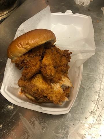 Fish sandwich  · whiting fish seasoned and fried to perfection then pilled up high a warm brioche bun with condiments on the side 