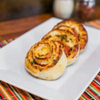 Pepperoni Pinwheels · Oven-baked rolls made with pepperoni and mozzarella.