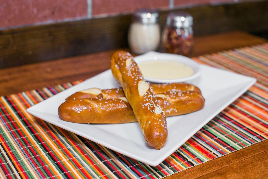 Bavarian Pretzel Dippers · Served with warm queso.