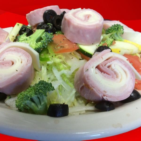 Chef Salad · (Ham, turkey,provolone cheese)Includes lettuce, tomato, onion, green peppers, black olives, broccoli,zucchini, squash and spices.