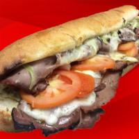 Roast Beef and Cheese Sub · Dressed with lettuce, tomato, onions, smoked provolone cheese, oil and vinegar and spices.