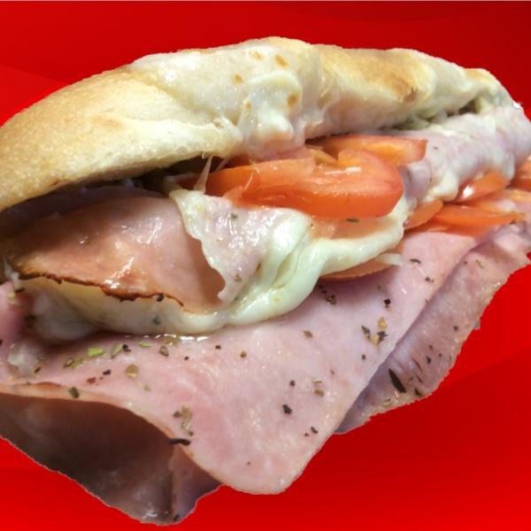 Ham and Cheese Sub · Dressed with lettuce, tomato, onions, smoked provolone cheese, oil and vinegar and spices.