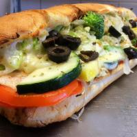 Cosmo Deluxe Sub · Lettuce, tomato, onions, broccoli, black olives, zucchini, squash, green pepper, oil, vinega...