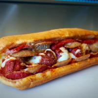 Monster Meatball Sub · We take our massive delicious meatballs, along with pepperoni, tangy sausage and our special...