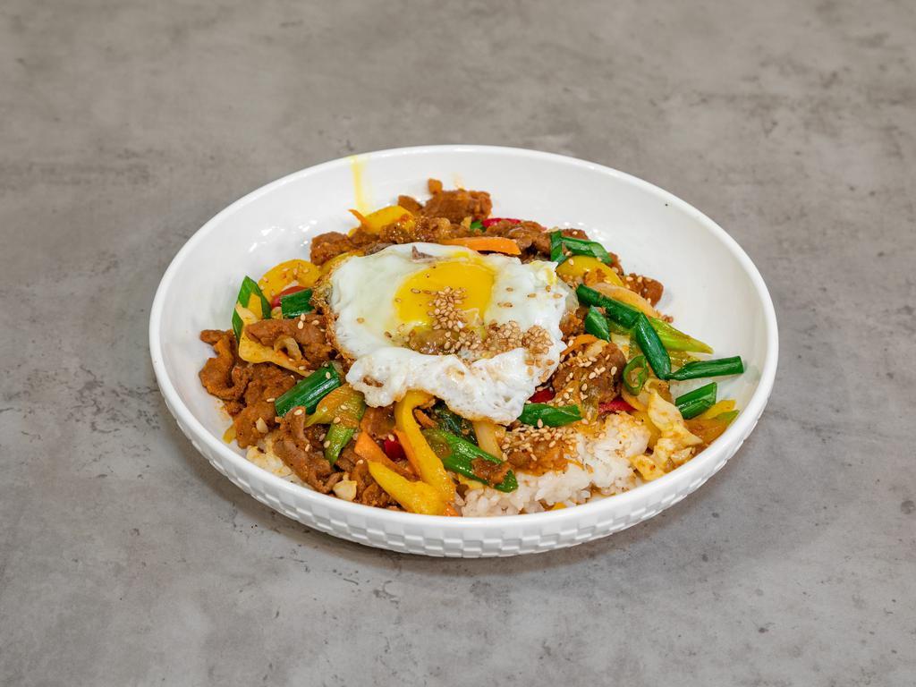 2. Bulgogi and Vegetable Rice  · Marinated beef in sweet soy sauce, sunnu side egg, assorted vegetables and spicy sauce.