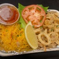 Fried Calamari Meal · Combination of fried calamari with garden salad in ranch sauce and a choice of pilaf rice or...