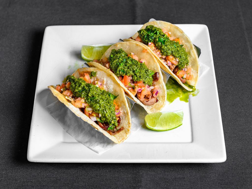 Tacos ( Choice of Wild shrimp or Steak ) · 