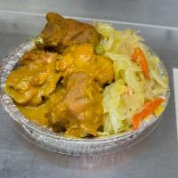 Curry Chicken · Served with 2 sides; rice and peas, white rice, cabbage or collard greens 