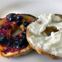 Bagel Cream Cheese and Jelly · Boiled and baked round bread roll.