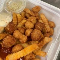Scallop Dinner · Delicious Fried Scallops with our seasoned fries, colesale and roll