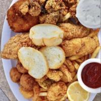Fried Tappout Platter · fries catfish, shrimps, and oysters served w/ fries and hush puppies