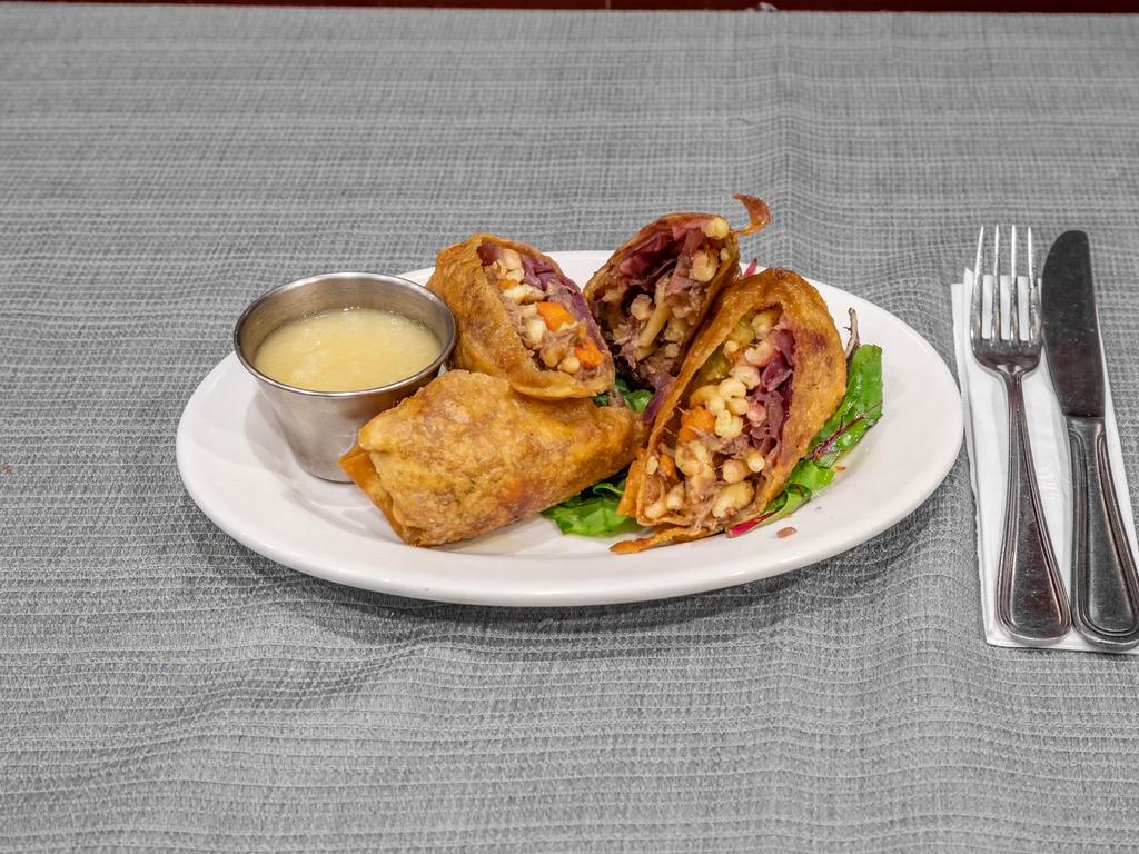Sauerbraten Eggrolls · Our Traditional Dish re-styled, Served Inside of a Fried Shell.