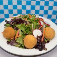 Toasted Goat Cheese Salad · Our House Salad Tossed in Balsamic Dressing with Fried Goat Cheese Balls. (Do not add Goat C...
