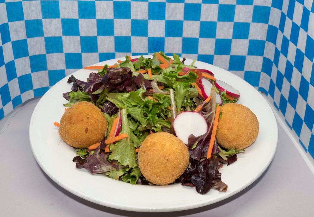 Toasted Goat Cheese Salad · Our House Salad Tossed in Balsamic Dressing with Fried Goat Cheese Balls. (Do not add Goat Cheese in Modifiers, it already comes with them.)