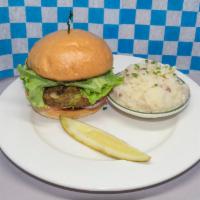 Veggie Burger · Served on a Fresh-Baked Brioche Bun with Lettuce, Tomato and Onions.