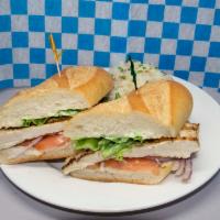 Grilled Chicken Club · Served on a Club Roll with Lettuce, Tomato, Onion and Mayo.