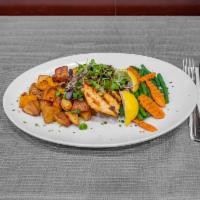 Grilled Salmon · Served with Roasted Potatoes & Sautéed Vegetables.