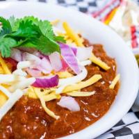 Bowl of Chili · Homemade chili served with onions and grated cheese. Served with choice of crackers or torti...