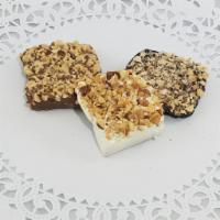 1/2 lb. English Toffee · Our best seller! You'd be amazed what butter, sugar, almonds and chocolate can do. Choice of...