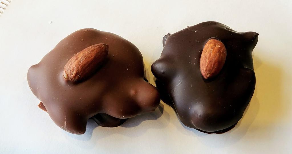 1/2 lb. Almond Turtles · Nuts, Caramel & Chocolate. Approximately 6-10 pieces. Milk or dark chocolate.