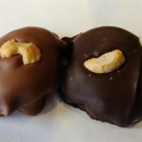 1/2 lb. Cashew Turtles · Nuts, Caramel & Chocolate. Approximately 6-10 pieces. Milk or dark chocolate.